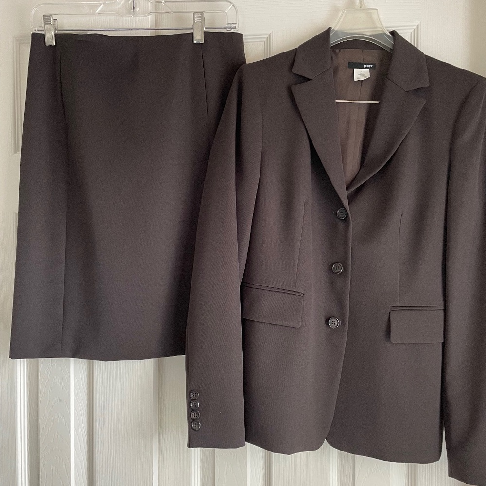 Never worn JCrew suit (jacket & skirt). Dark brown.